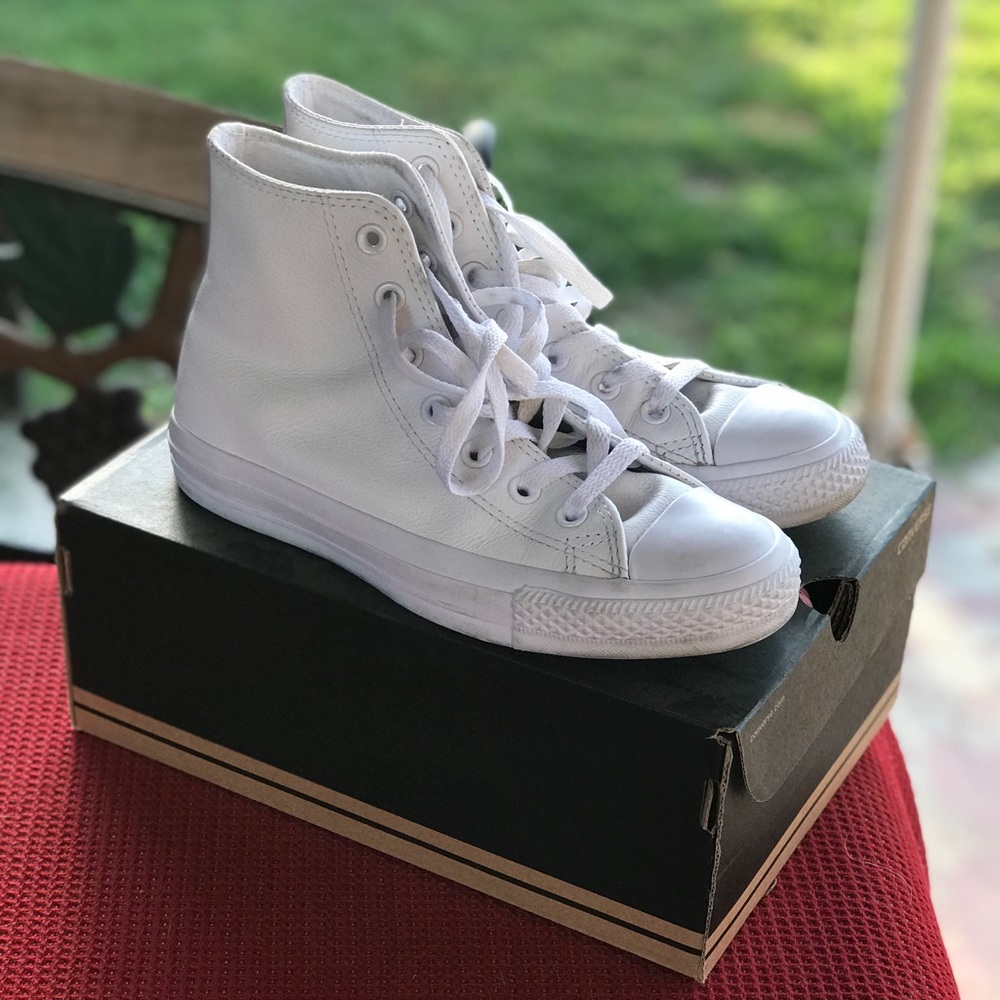 All white leather high top converse